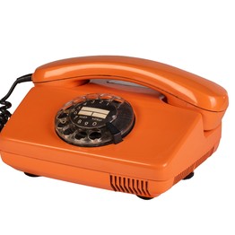 Ein orangenes Telefon mit Wählscheibe aus den 70er Jahren